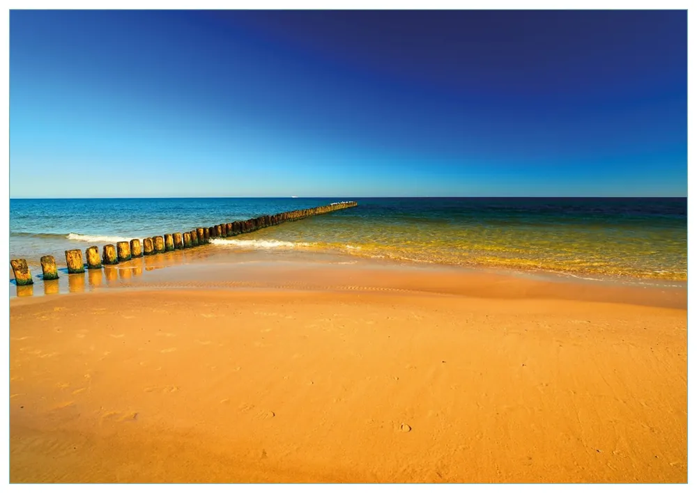 Glasbild Sandstrand in orange - Blaues Meer - Blauer Himmel 50 cm Durchmesser. rund Sonderaktion