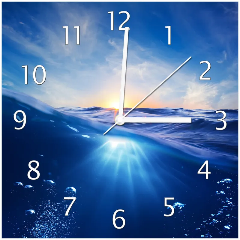 Abverkauf Wanduhr aus Glas Wellen im Meer bei Sonnenuntergang mit weißen Zeigern, 20 x 20 cm