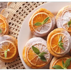 Top-Seller Küchenrückwand Frische Biskuits mit Orangenscheiben aus Glas, 90 x 60 cm