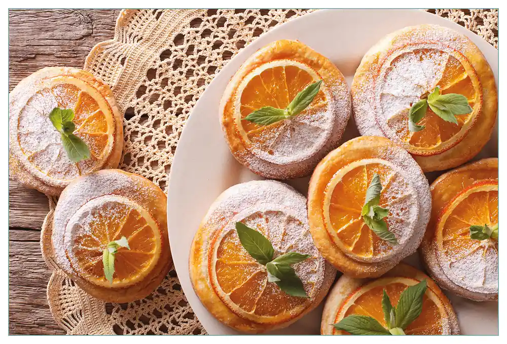Top-Seller Küchenrückwand Frische Biskuits mit Orangenscheiben aus Glas, 90 x 60 cm
