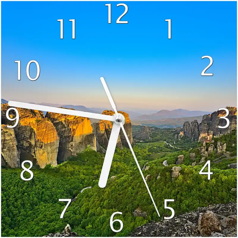 Abverkauf Wanduhr aus Glas Griechische Berglandschaft mit schwarzen Zeigern, 30 x 60 cm